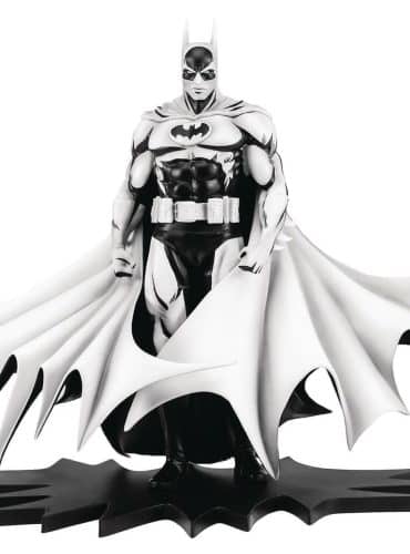 "Black and white 1/8 scale Batman statue, limited edition, inspired by Neal Adams' artwork, in illustrated box."