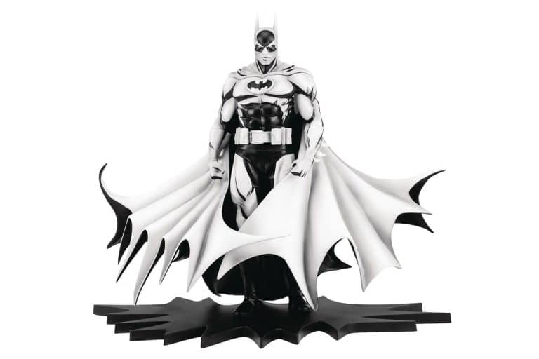 "Black and white 1/8 scale Batman statue, limited edition, inspired by Neal Adams' artwork, in illustrated box."