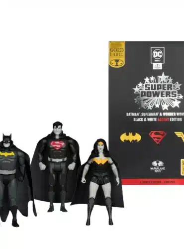 "Exclusive SDCC 2024 Gold Label 3-pack of black & white Batman, Superman, and Wonder Woman action figures by McFarlane Toys."