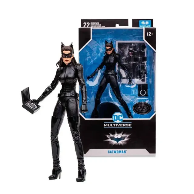 "7-inch mcfarlane dc multiverse the dark knight rises catwoman platinum figure, showcasing the character in her sleek costume with signature goggles, intricate body armor, and whip accessory, standing upright on a display base. "