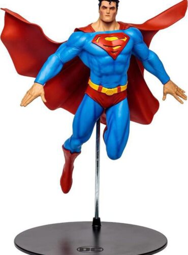 "12-inch McFarlane DC Multiverse Superman statue, inspired by 'For Tomorrow' comic, in dynamic pose with red flowing cape."