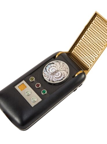 "Star Trek Original Series Starfleet Communicator replica by Playmates with open antenna grill."