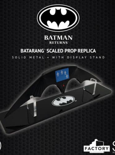 "Officially licensed Batman Returns Batarang prop replica by Factory Entertainment with display stand."