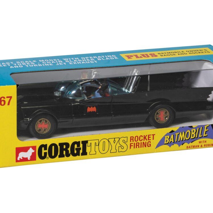 "Corgi 1966 Batmobile diecast model with Batman & Robin figures, featuring rockets, a tow hook, and chain slasher blade."